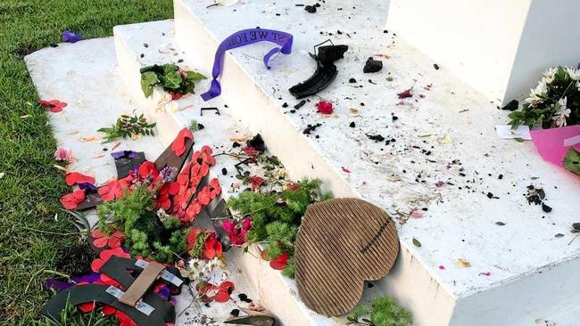 'DISGUSTING': The floral memorial placed at the Imbil cenotaph was trashed by a group of kids over the weekend. Picture: Contributed