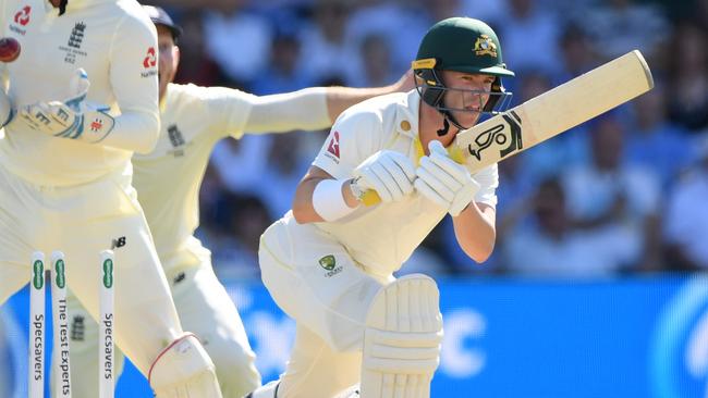 Marcus Harris is knocked over by Jack Leach at Headingley.