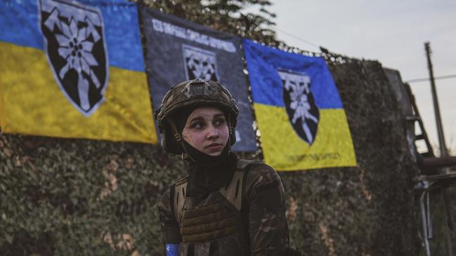 ZAPORIZHZHIA, UKRAINE - JULY 15: Female members of the Ukrainian Army's 128th Carpathian Mountain Assault Brigade train in different combat scenarios including various obstacles in conditions similar to the situation on the frontline as they prepare to take part on the frontline in Zaporizhzhia, Ukraine on July 15, 2023. Over sixty thousand women including military press officers, health specialists and psychologists are a part of the brigade. (Photo by Ercin Erturk/Anadolu Agency via Getty Images)