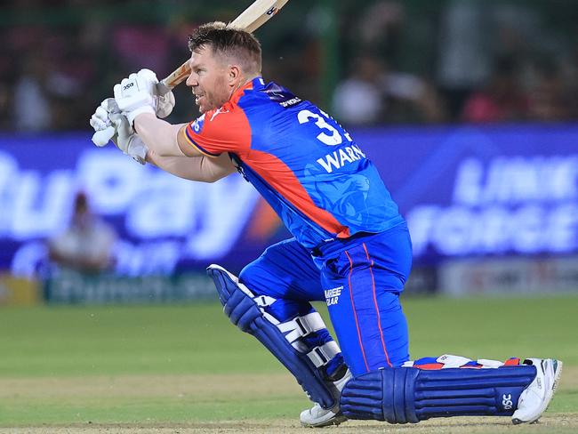 David Warner of the Delhi Capitals is playing a shot during the Indian Premier League (IPL) 2024 T20 cricket match between the Rajasthan Royals and Delhi Capitals at Sawai Mansingh Stadium in Jaipur, Rajasthan, India, on March 28, 2024. (Photo by Vishal Bhatnagar/NurPhoto via Getty Images)