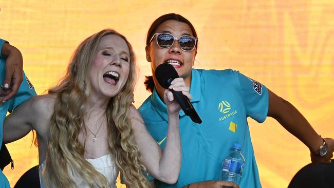 Sam Kerr sings with Nikki Webster. Picture: Dan Peled / NCA NewsWire.