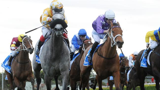 Pure Elation (left) kicks clear of Fiesta to win the Furious Stakes. Picture: AAP