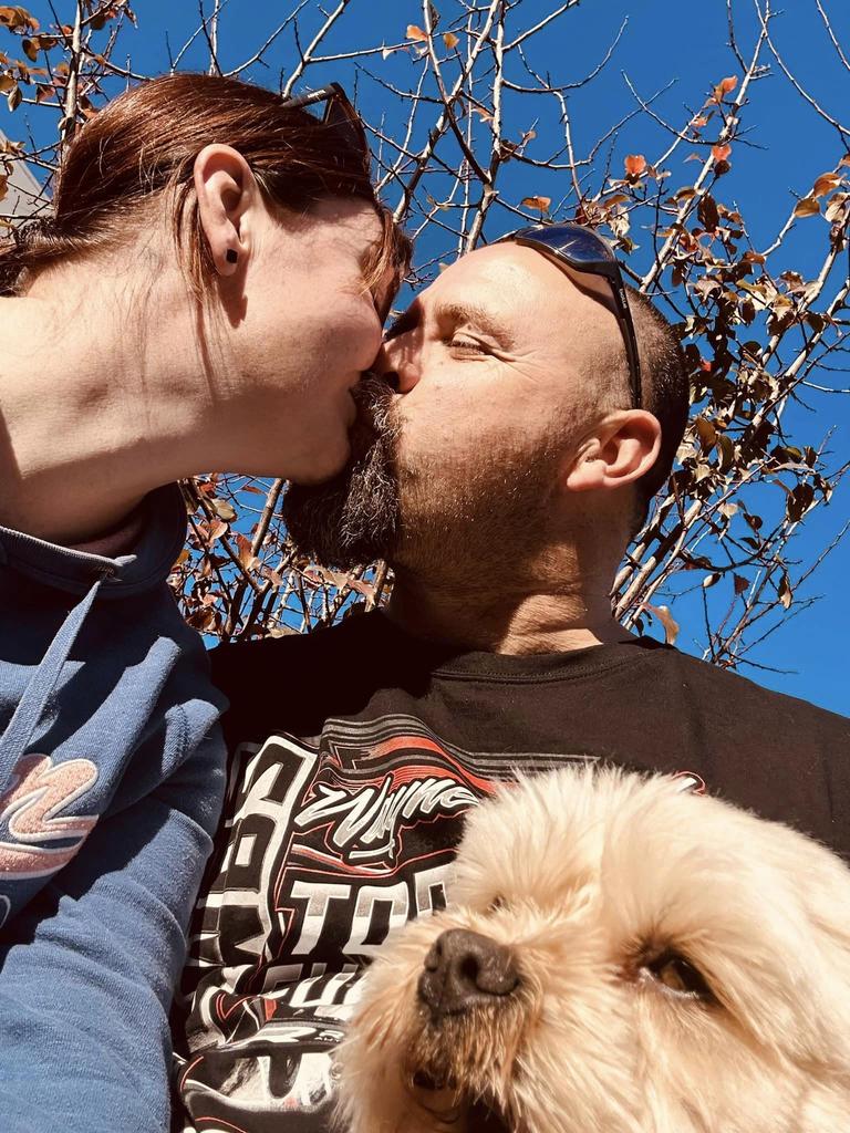 Greg Hollinshed and Ally Storr with their dog Chewy before Greg’s surgery. Picture: Supplied by family