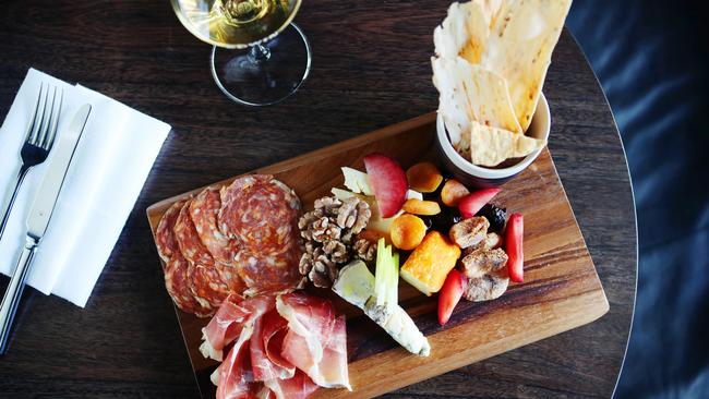 Victoria on a plate: the meat and cheese platter is a happy hour bargain. Pictures Rebecca Michael.