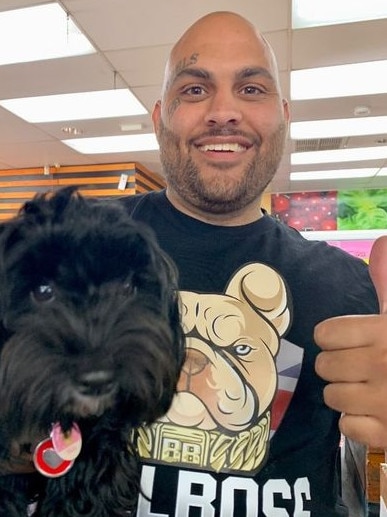 Bradley Daniele with Arlo the Cancer support dog. Picture: @arlo_the_cancer_service_dog / Instagram