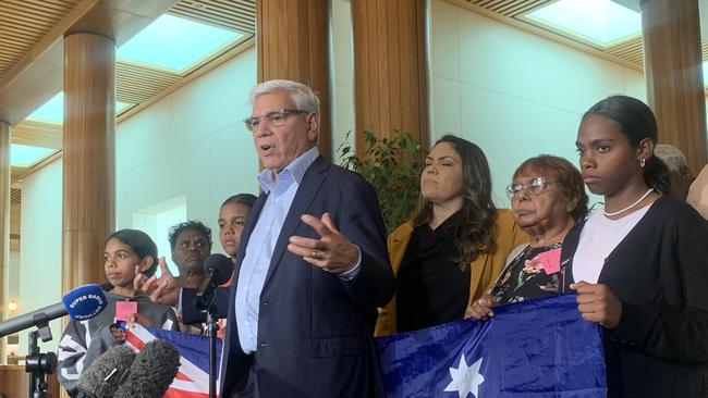 Warren Mundine with 22 Indigenous community leaders, including Senator Jacinta Nampijinpa Price (behind him) in Canberra.