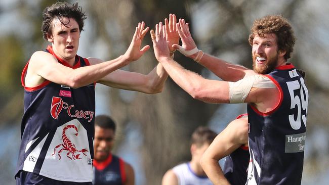 Oscar McInerney (left) was rookie listed by Brisbane.