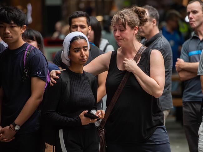 Students held hands, prayed and read heartfelt messages for Aiia at the vigil. Picture: Jason Edwards