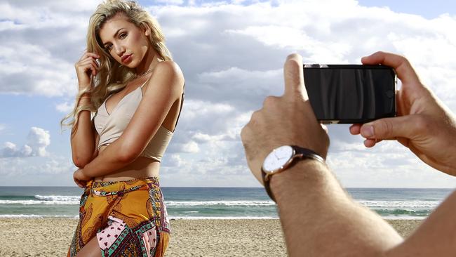 Instagram model and star Gabby Epstein and her boyfriend Conner Malan at Burleigh Beach. Picture: Jerad Williams