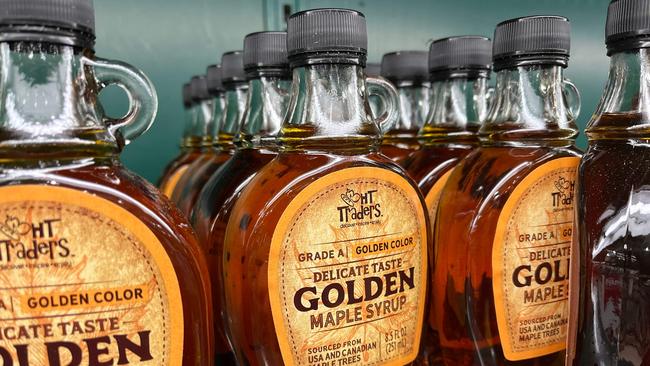 Bottles of Canadian maple syrup. Photo by SAUL LOEB / AFP