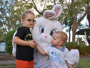 ROMA EASTER: William and James Neven with the Easter Bunny at this year's Easter in the Country. Picture: Ellen Ransley