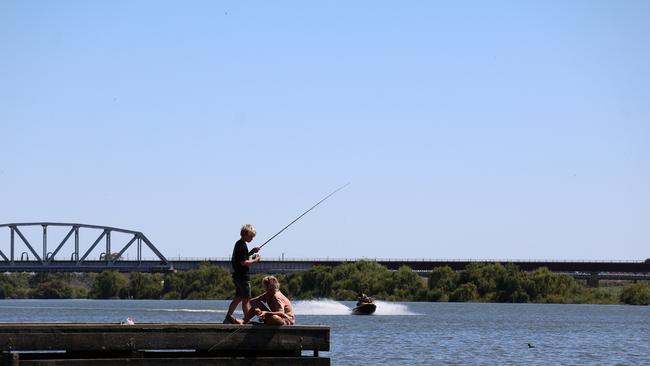 Fishing down at Sturt Reserve on the waterfront of the River Murray. Picture: trades_travelcountry