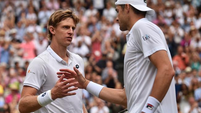 Kevin Anderson meets John Isner at the net after their semi-final. Picture: AP