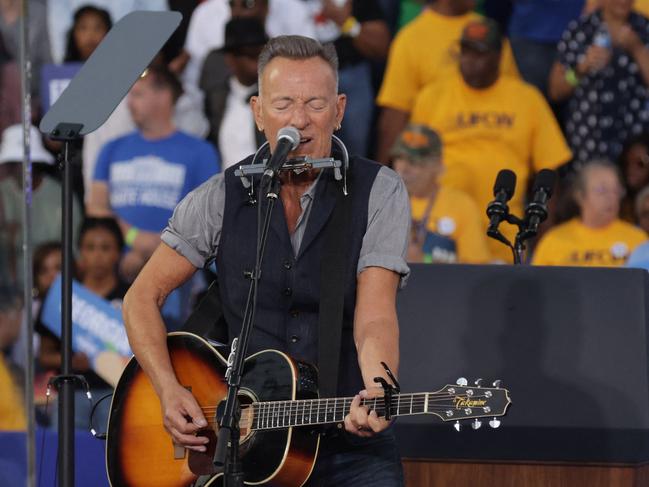 CLARKSTON, GEORGIA - OCTOBER 24: Musician Bruce Springsteen performs during a campaign event for Democratic presidential nominee, U.S. Vice President Kamala Harris with former President Barack Obama at the James R Hallford Stadium on October 24, 2024 in Clarkston, Georgia. Harris and Republican presidential nominee, former U.S. President Donald Trump, continue campaigning in battleground swing states before the November 5 election.   Alex Wong/Getty Images/AFP (Photo by ALEX WONG / GETTY IMAGES NORTH AMERICA / Getty Images via AFP)