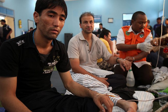 <p>Survivors of the Indonesian boat tragedy. Picture: Lukman Bintoro</p>