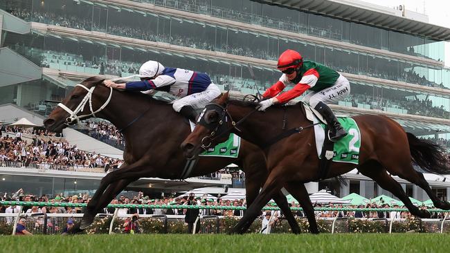 Atishu surges late to defeat Amelia’s Jewel in the Empire Rose Stakes at Flemington. Picture: Robert Cianflone/Getty Images