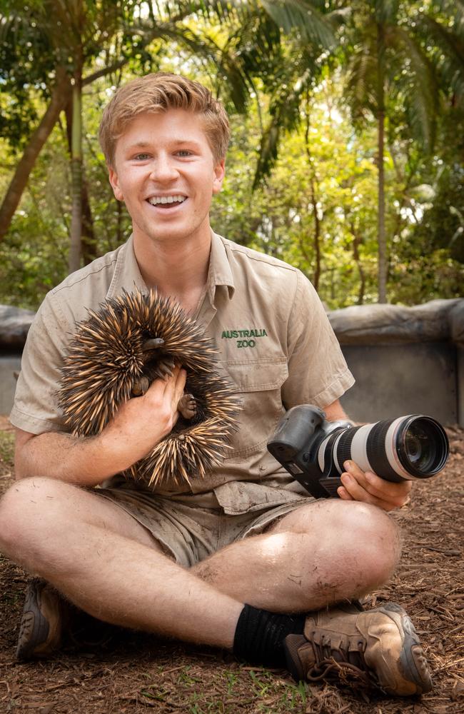 Robert Irwin cuddles an echnidna at Australia Zoo. Picture: Kate Berry