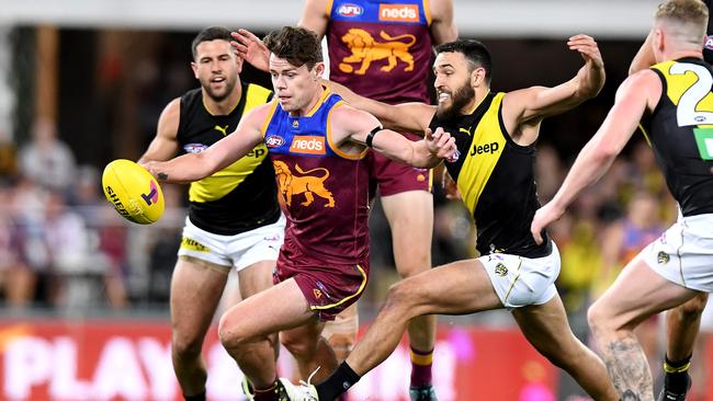 Lachie Neale of the Lions gets a kick away during the qualifying final. Picture: Bradley Kanaris/Getty Images