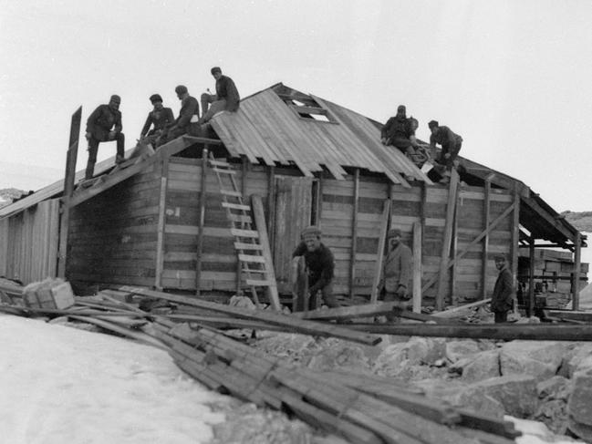 The Australasian Antarctic Expedition (AAE) in 1911-1914, building the main hut at Cape Denison. It was the base for an expedition led by Australia’s greatest polar explorer Sir Douglas Mawson.