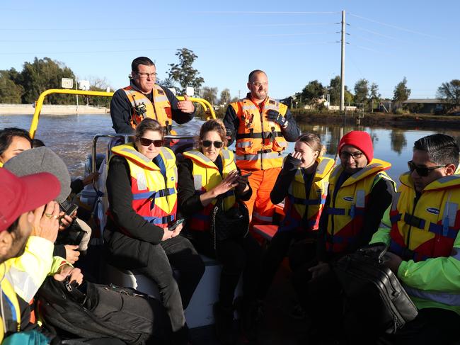 Hawkesbury SES transports stranded Coles and medical staff to Wilberforce to get to work. Picture: John Grainger