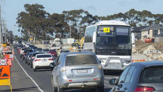 Mickleham Rd morning peak hour traffic near the entrance to Aitken College. Picture: Rob Leeson.