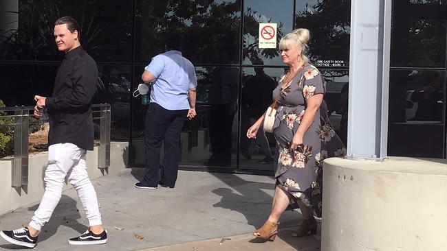 Christian James Farrell, 21, leaves Southport Court with his mother (right) after being sentenced for assaulting a homeless man on October 25, 2019. Picture: JODIE CALLCOTT.