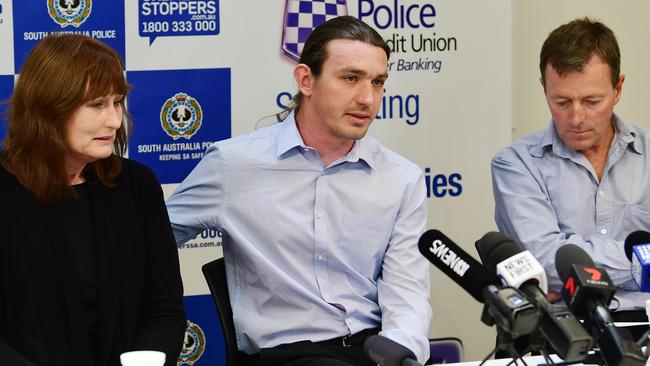 Michael Purse’s mother, Donna Ipers, his brother Andrew Purse, and father Jeffery Purse during a police press conference in 2019. Picture: Mark Brake