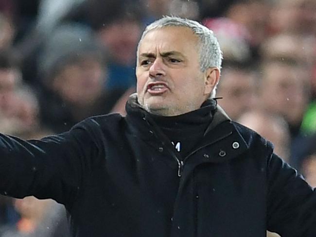 Manchester United's Portuguese manager Jose Mourinho gestures on the touchline during the English Premier League football match between Liverpool and Manchester United at Anfield in Liverpool, north west England on December 16, 2018. (Photo by Paul ELLIS / AFP) / RESTRICTED TO EDITORIAL USE. No use with unauthorized audio, video, data, fixture lists, club/league logos or 'live' services. Online in-match use limited to 120 images. An additional 40 images may be used in extra time. No video emulation. Social media in-match use limited to 120 images. An additional 40 images may be used in extra time. No use in betting publications, games or single club/league/player publications. /