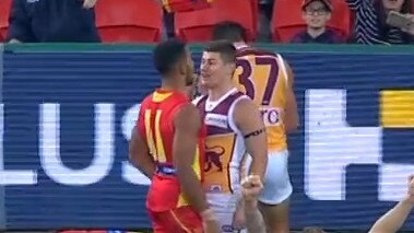 Dayne Zorko and Touk Miller clash.