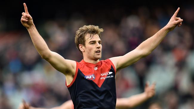 Dom Tyson of the Demons reacts after kicking a goal. (AAP Image/Julian Smith)
