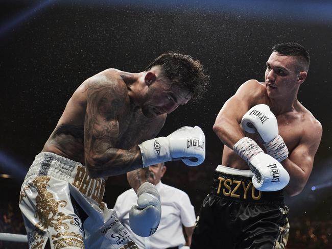 Tim Tszyu slugs Jack Brubaker in Sydney on December 06. (Photo by Brett Hemmings/Getty Images)