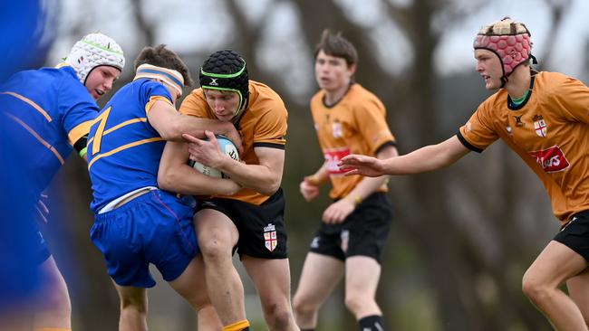 Action in last year’s under 16s game.