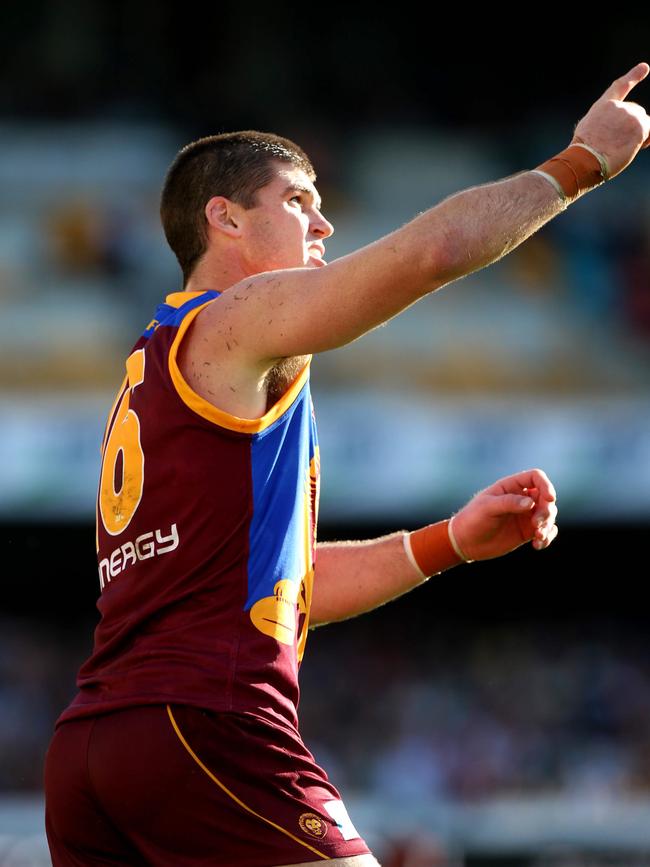 Jonathan Brown celebrates a goal.