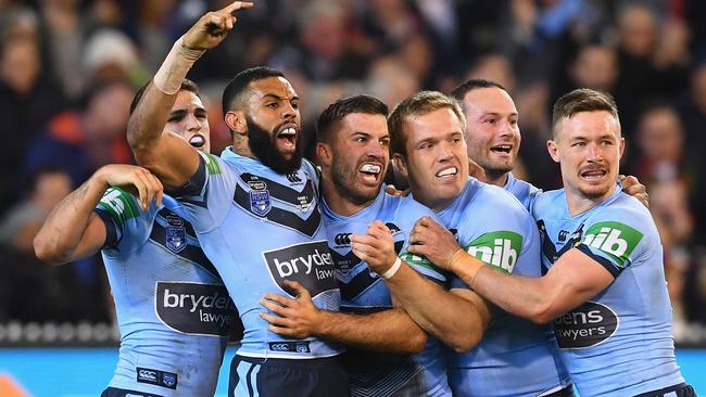 The Blues celebrate after James Tedesco late first-half try. (Quinn Rooney/Getty Images)