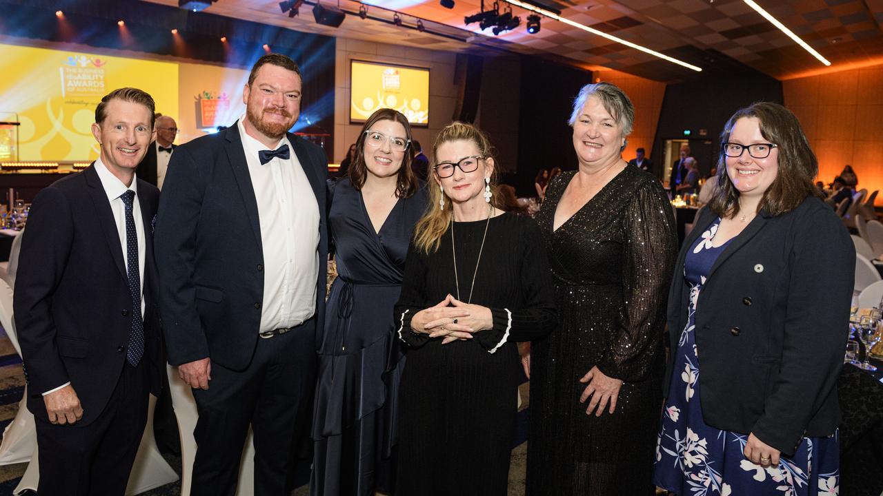 At the Business disAbility Awards of Australia are (from left) guest speaker Michael Crossland, Tim Connolly, Christa Connolly, Joyanne Clarke, Cath Clark and Kyra Black at Edmund Rice Cultural Centre, Saturday, May 17, 2025. Picture: Kevin Farmer