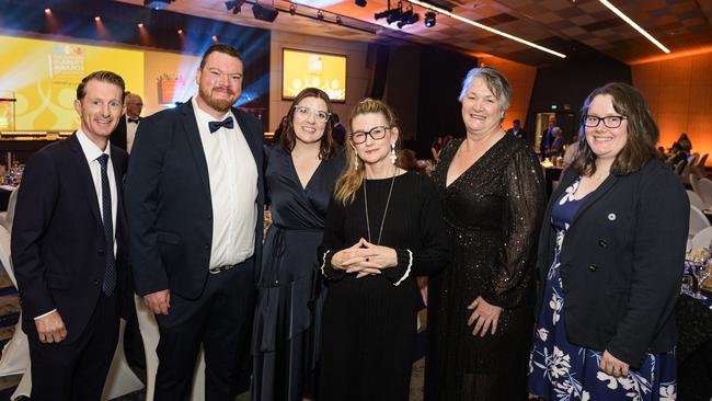 At the Business disAbility Awards of Australia are (from left) guest speaker Michael Crossland, Tim Connolly, Christa Connolly, Joyanne Clarke, Cath Clark and Kyra Black at Edmund Rice Cultural Centre, Saturday, May 17, 2025. Picture: Kevin Farmer
