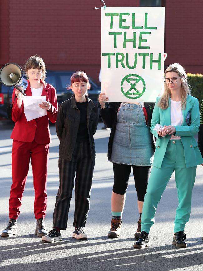 Extinction Rebellion activists outside The Courier-Mail’s office in Bowen Hills. Picture: Liam Kidston