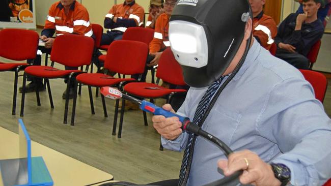 AUGMENTED REALITY: Garry Hargreaves from Tafe Queensland demonstrates fusion welding to attendees at the South West Tafe in Kingaroy. Picture: Matt Collins