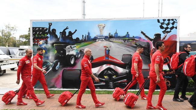 Members of the Ferrari team pack up after the Formula One Australian Grand Prix was cancelled in Melbourne because of coronavirus on March 13. Picture: AFP