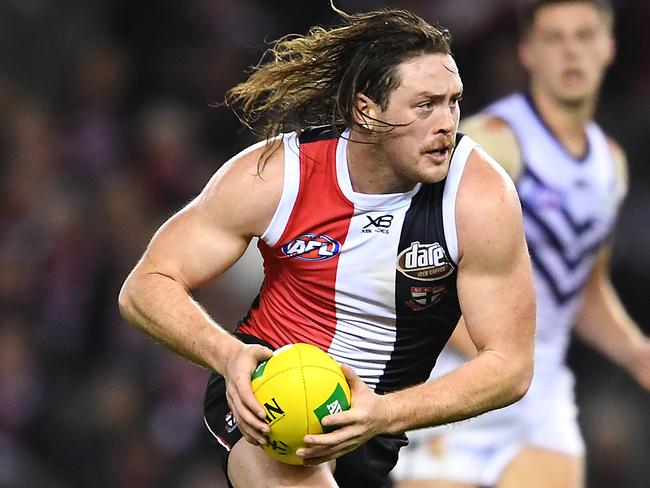 MELBOURNE, AUSTRALIA - AUGUST 11: Jack Steven of the Saints runs with the ball during the round 21 AFL match between the St Kilda Saints and the Fremantle Dockers at Marvel Stadium on August 11, 2019 in Melbourne, Australia. (Photo by Quinn Rooney/Getty Images)