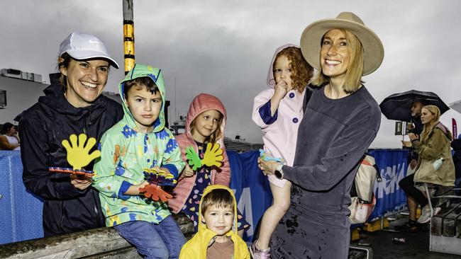 Triathlon fans Kellie Butler with her children Jenson aged 5 and Remy, 3 and Eva,5 and Matea aged 2 with their mum Jo Ross. Picture: Linda Higginson.