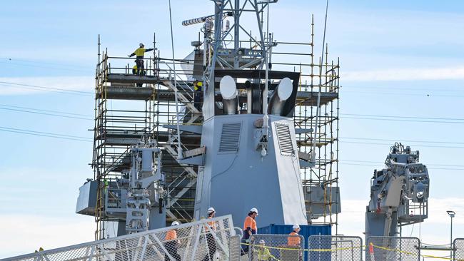 Workers fitting out the HMAS Arafura offshore patrol vessel at the Osborne Naval Shipyard. Picture: NCA NewsWire / Brenton Edwards