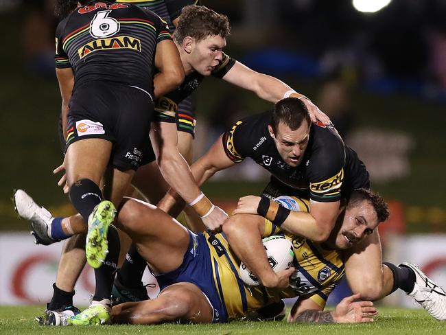 Campbell-Gillard brought to the ground by his old teammates. Picture: Mark Kolbe/Getty Images