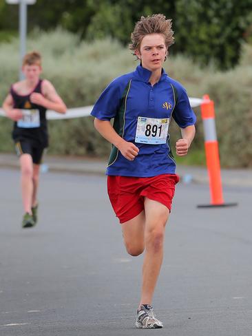 Steven Roach, from St. Virgil’s College, competes in the run leg in the grade 7 individual boys section.