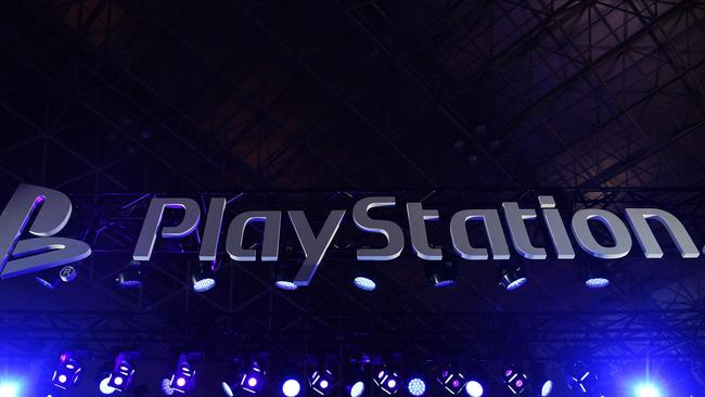 (FILES) In this file photo taken on September 12, 2019 the Sony Playstation logo is seen during the Tokyo Game Show in Makuhari, Chiba Prefecture. - Sony said October 8, 2019 its next-generation PlayStation 5 console, with new immersive features giving players the tactile experience of virtual worlds, would launch for the 2020 holiday season. The Japanese electronics firm, which had teased its new console earlier this year, said a major new feature of the updated console would be its immersive controller. (Photo by CHARLY TRIBALLEAU / AFP)