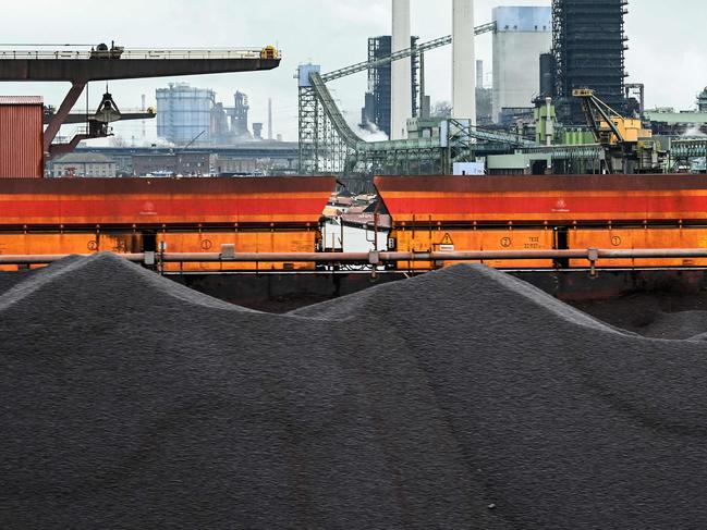 Coal stocks are seen at the Thyssenkrupp Steel Europe AG in Duisburg, western Germany on February 22, 2022. - German Minister of Economics and Climate Protection Robert Habeck visits thyssenkrupp to learn about hydrogen solutions along the entire process chain as a driver of climate change. (Photo by Ina FASSBENDER / AFP)