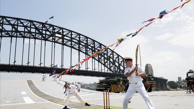 Navy officers play cricket on board HMAS Canberra on Australia Day in Sydney. Picture: Nikki Short