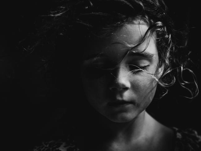 Overall winner and portrait winner: Helen Whittle ... Picking up her DSLR after her first child was born in 2008, Whittle says she loves to capture her children, animals and nature and is inspired by natural and dramatic light. Her style is mainly black and white, and she aims to produce simple, emotive and authentic images. Picture: Helen Whittle/Australian Photography magazine