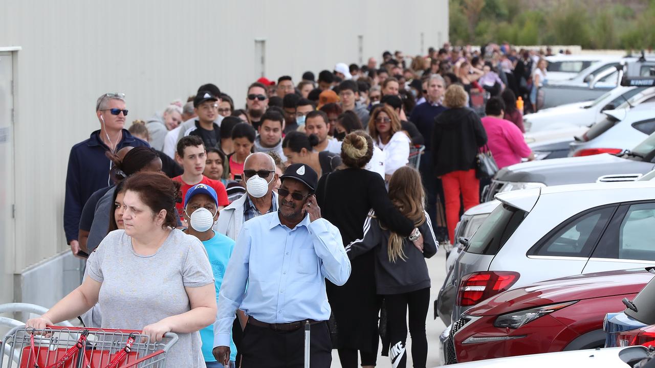 Shoppers line up around the building waiting to enter at Costco Perth. Picture: Paul Kane/Getty Images