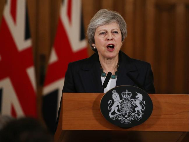 LONDON, ENGLAND - NOVEMBER 15: Britain's Prime Minister Theresa May speaks during a press conference inside 10 Downing Street on November 15, 2018 in London England. Cabinet Ministers Dominic Raab, the Brexit Secretary, and Esther McVey, Work and Pensions Secretary resigned this morning after last night's cabinet meeting backed the draft Brexit agreement.  (Photo by Ian Vogler - WPA Pool/Getty Images)